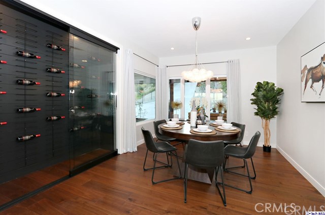 770 Panorama Place Pasadena, CA 91105 - Photo 6 of 35 a view of a dining room with furniture window and wooden floor