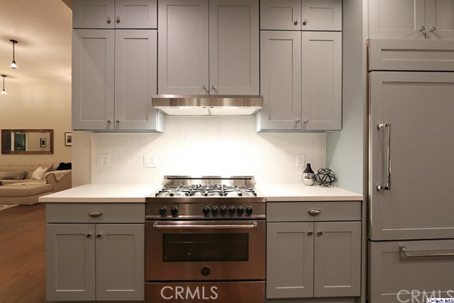 770 Panorama Place Pasadena, CA 91105 - Photo 10 of 35 a kitchen with a stove and a white cabinets