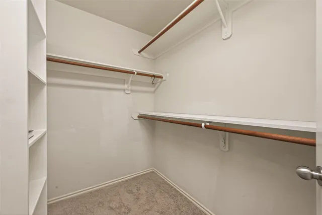 a view of a room with racks on the wall