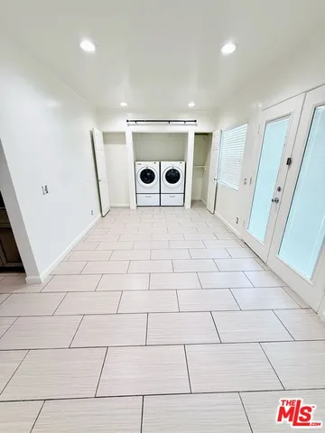 a view of an empty room with a sink