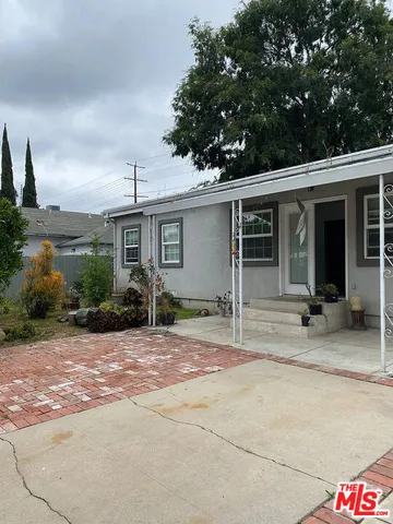a house with yard in front of it