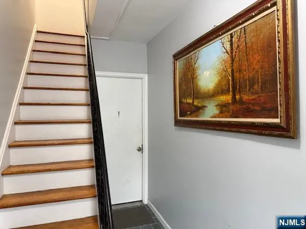 a view of entryway with a front door