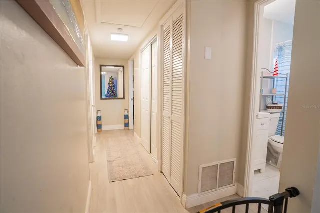 a view of a hallway with workspace