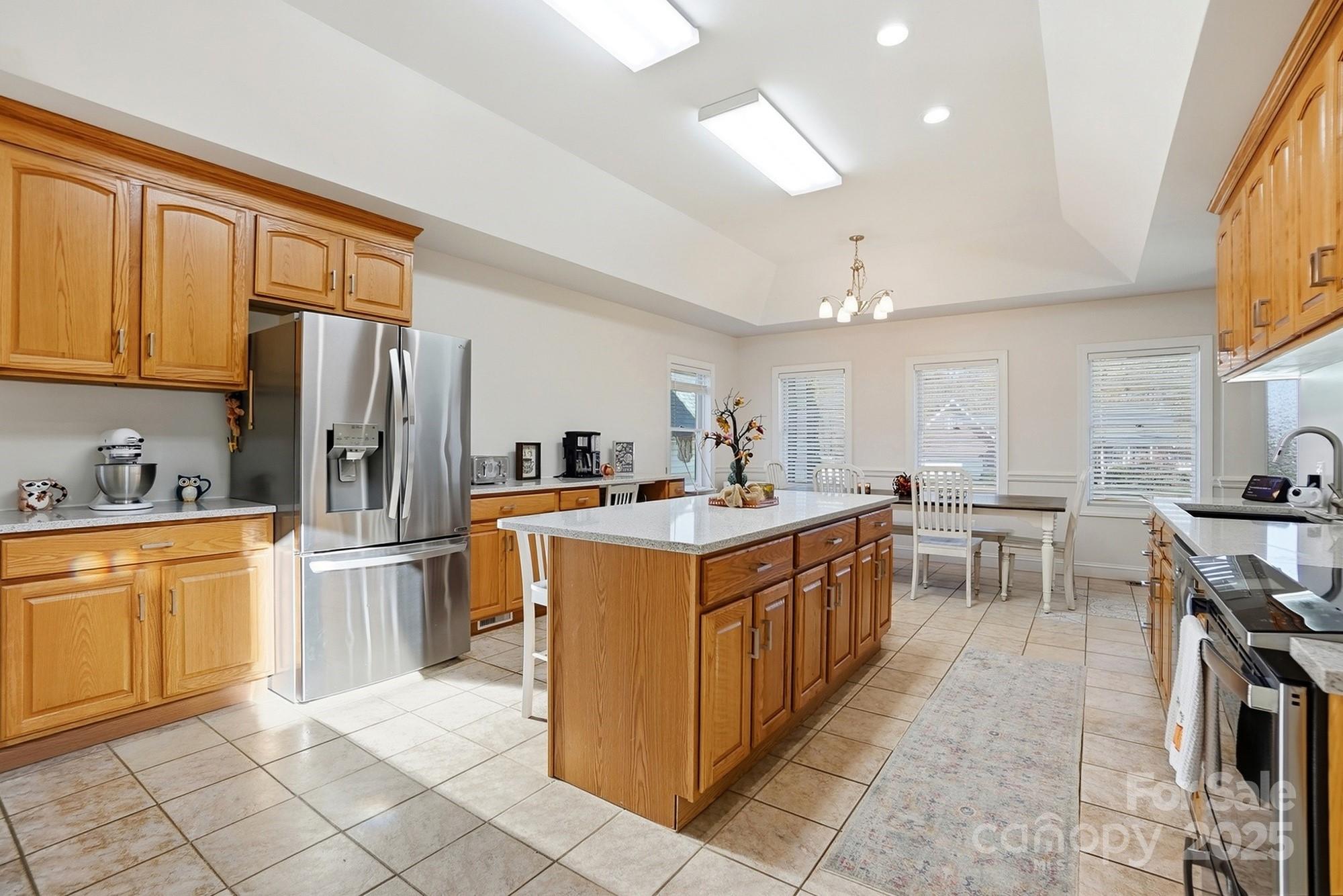 845 St Paul Church Road Salisbury, NC 28146 - Photo 11 of 44 a kitchen that has a lot of cabinets in it and appliances