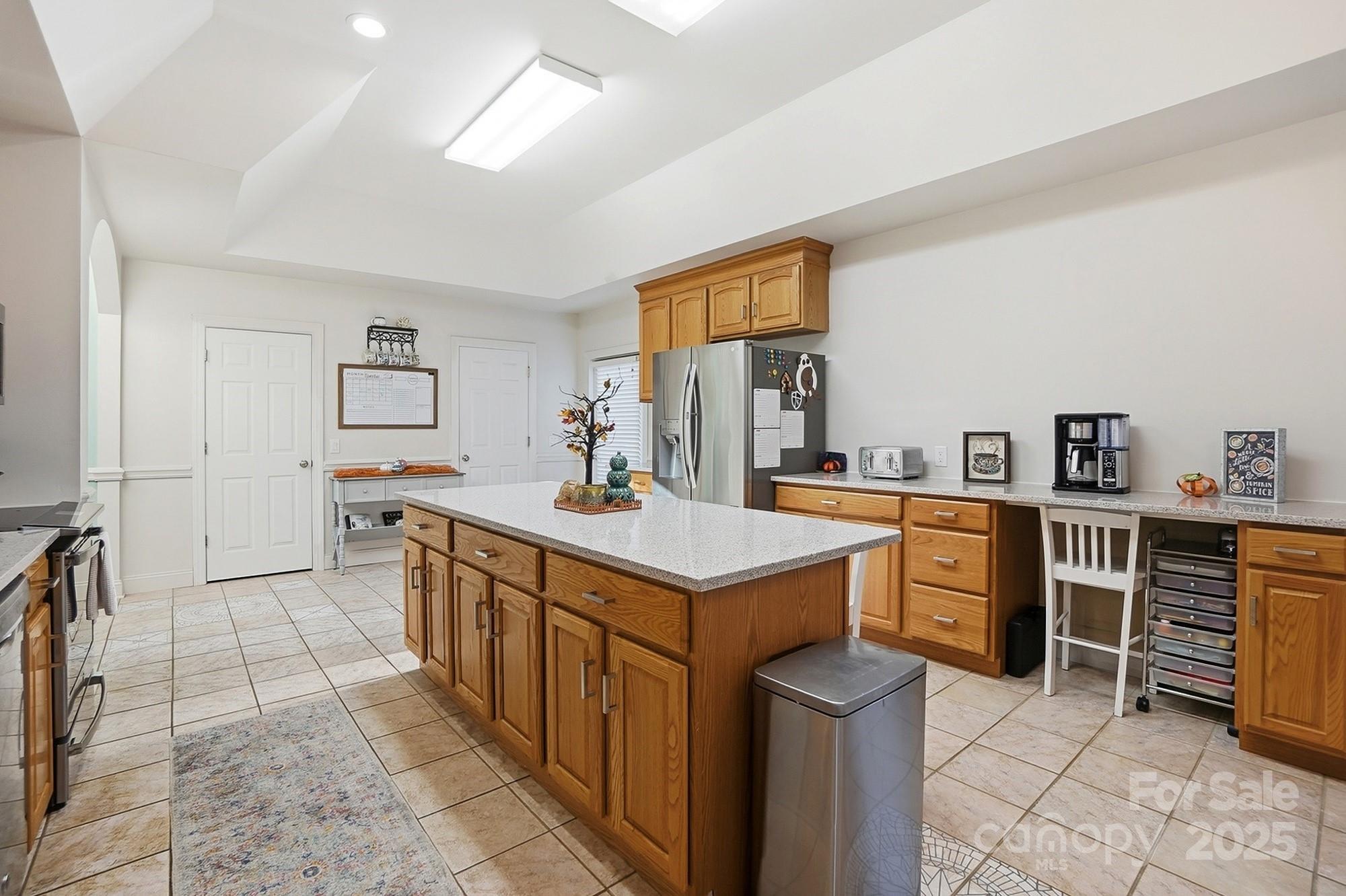 845 St Paul Church Road Salisbury, NC 28146 - Photo 15 of 44 a kitchen with sink cabinets and stove top oven
