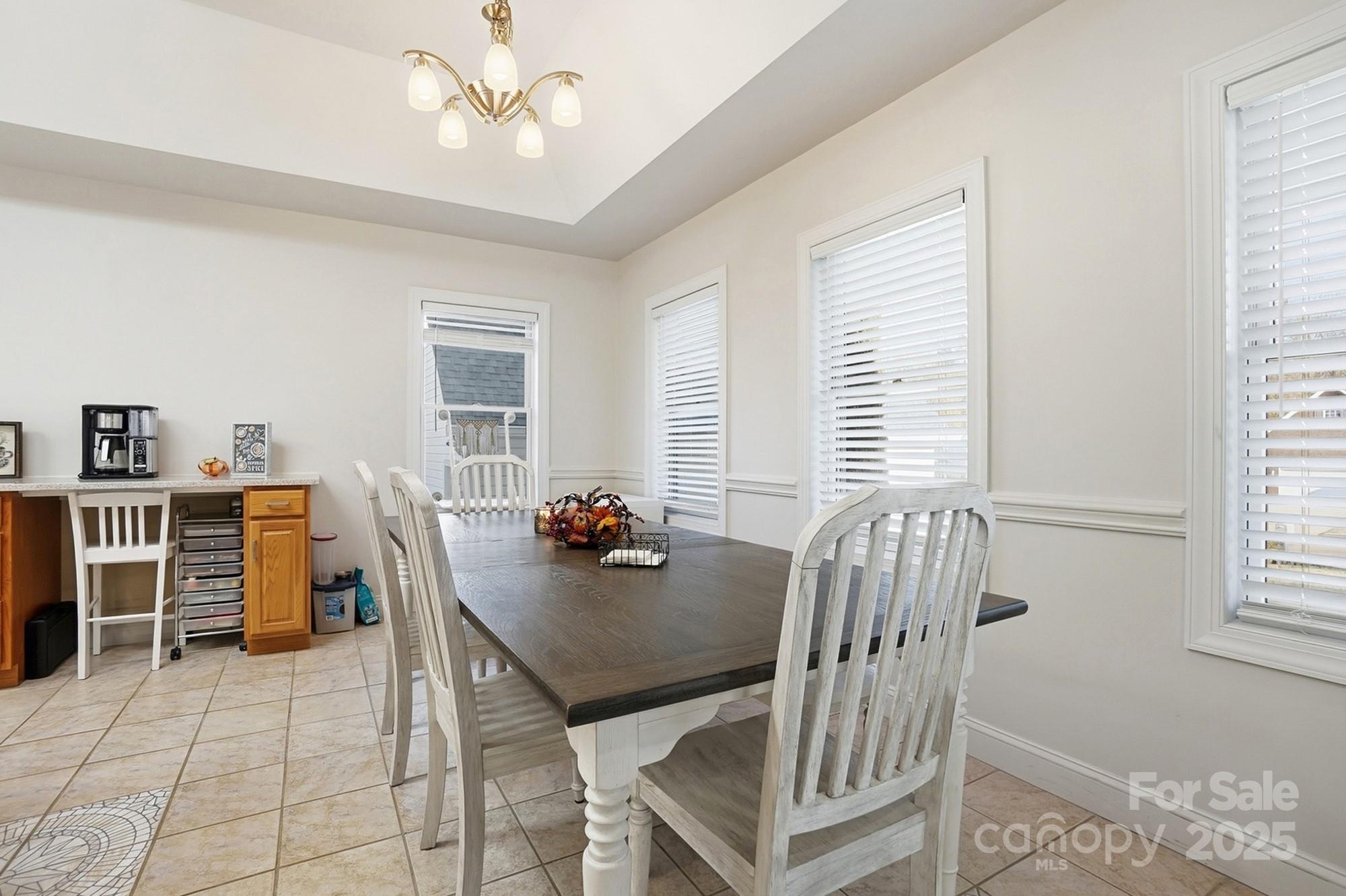 845 St Paul Church Road Salisbury, NC 28146 - Photo 16 of 44 a view of a workspace with furniture and a window