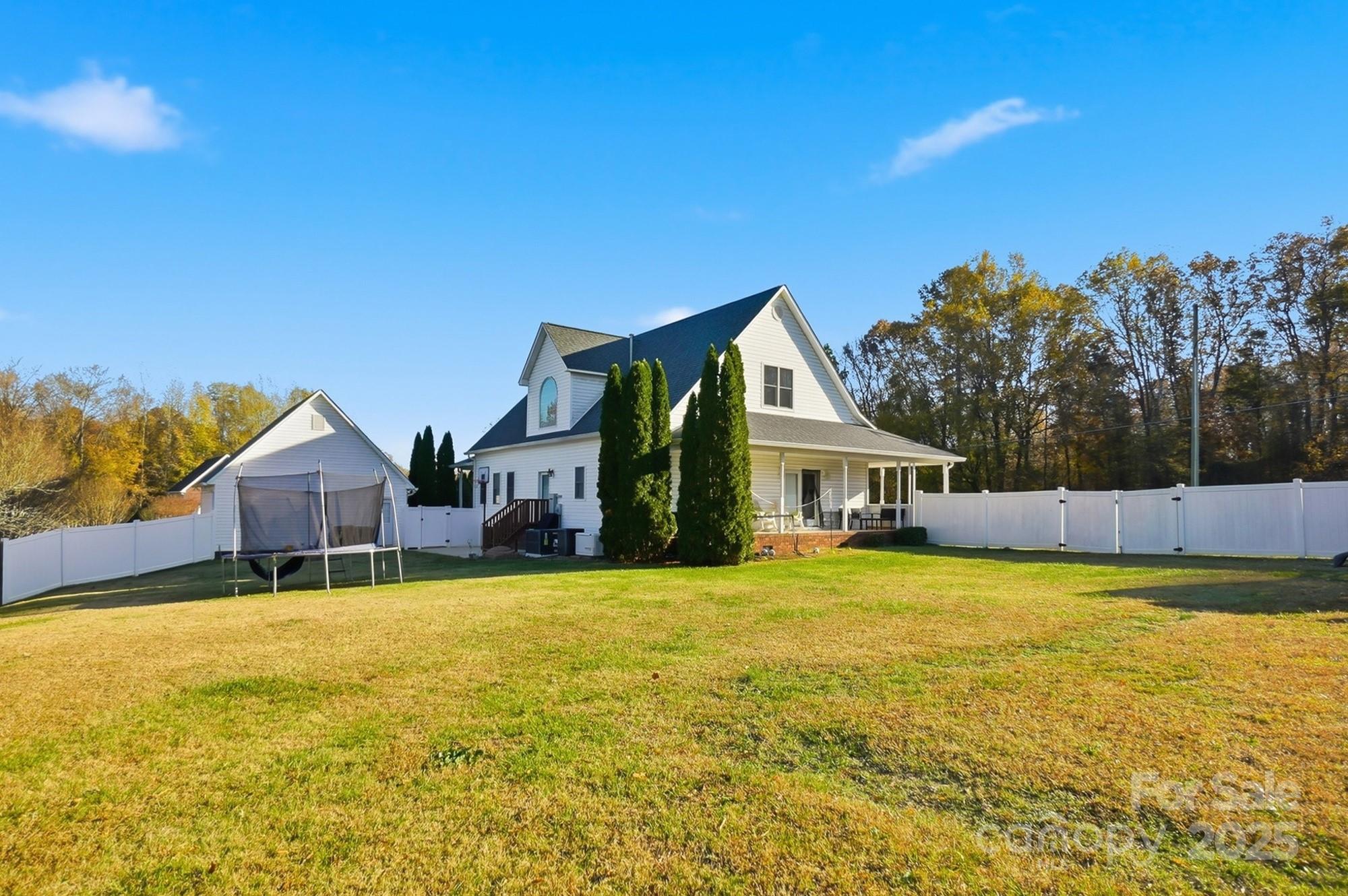 845 St Paul Church Road Salisbury, NC 28146 - Photo 21 of 44 a view of a house with a big yard