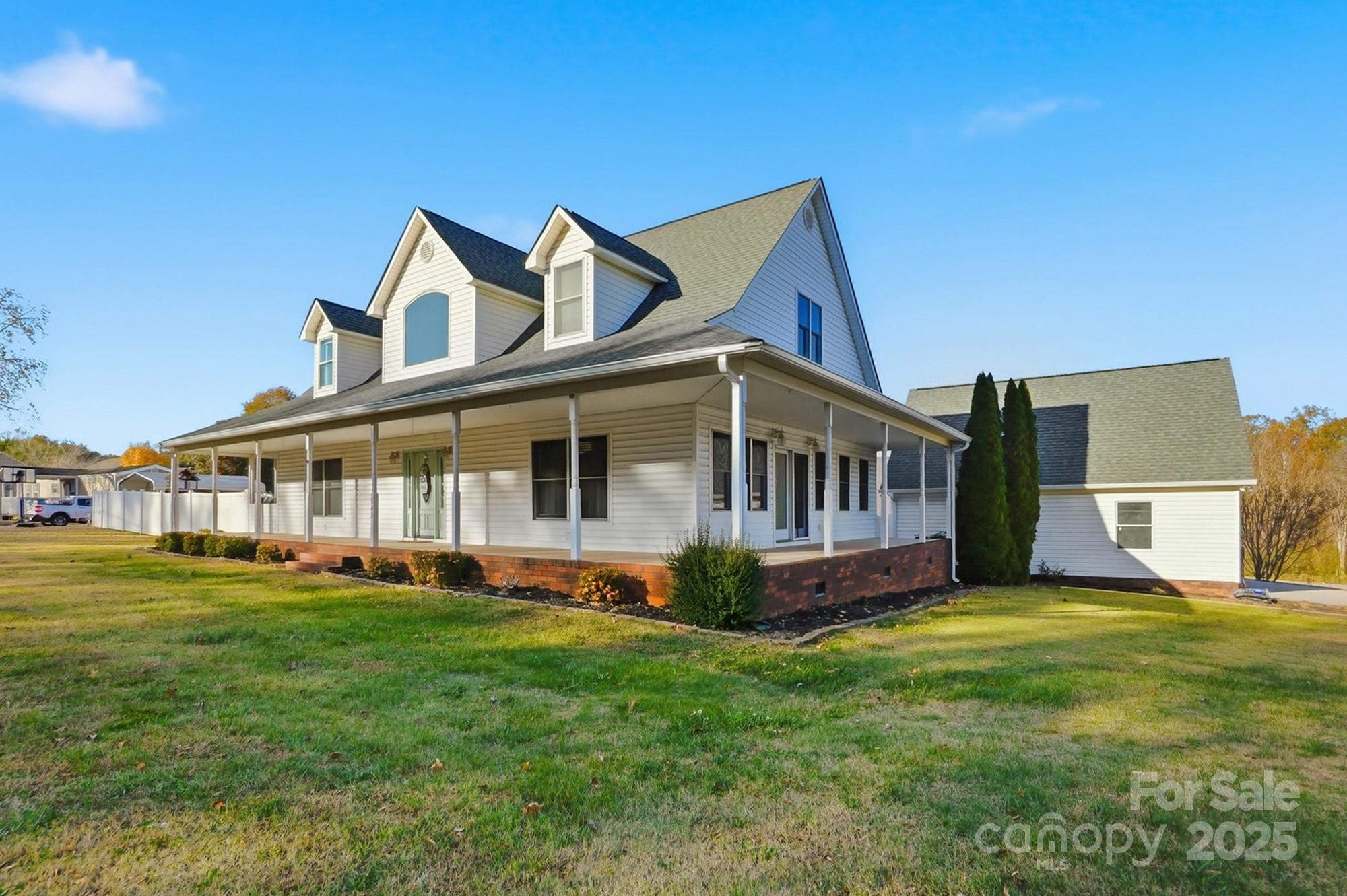 845 St Paul Church Road Salisbury, NC 28146 - Photo 23 of 44 a view of a house with a big yard