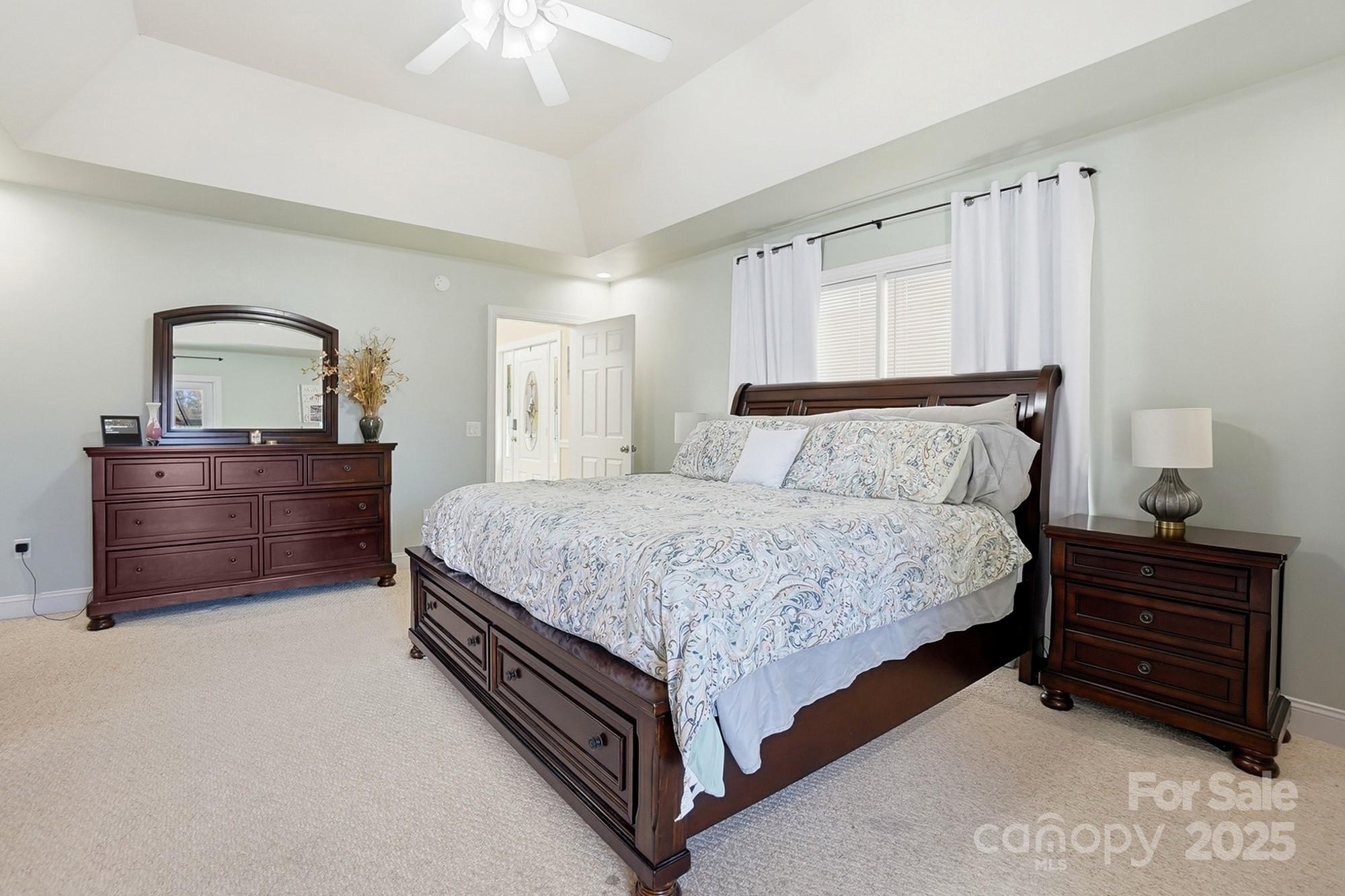 845 St Paul Church Road Salisbury, NC 28146 - Photo 28 of 44 a bedroom with a bed and a dresser