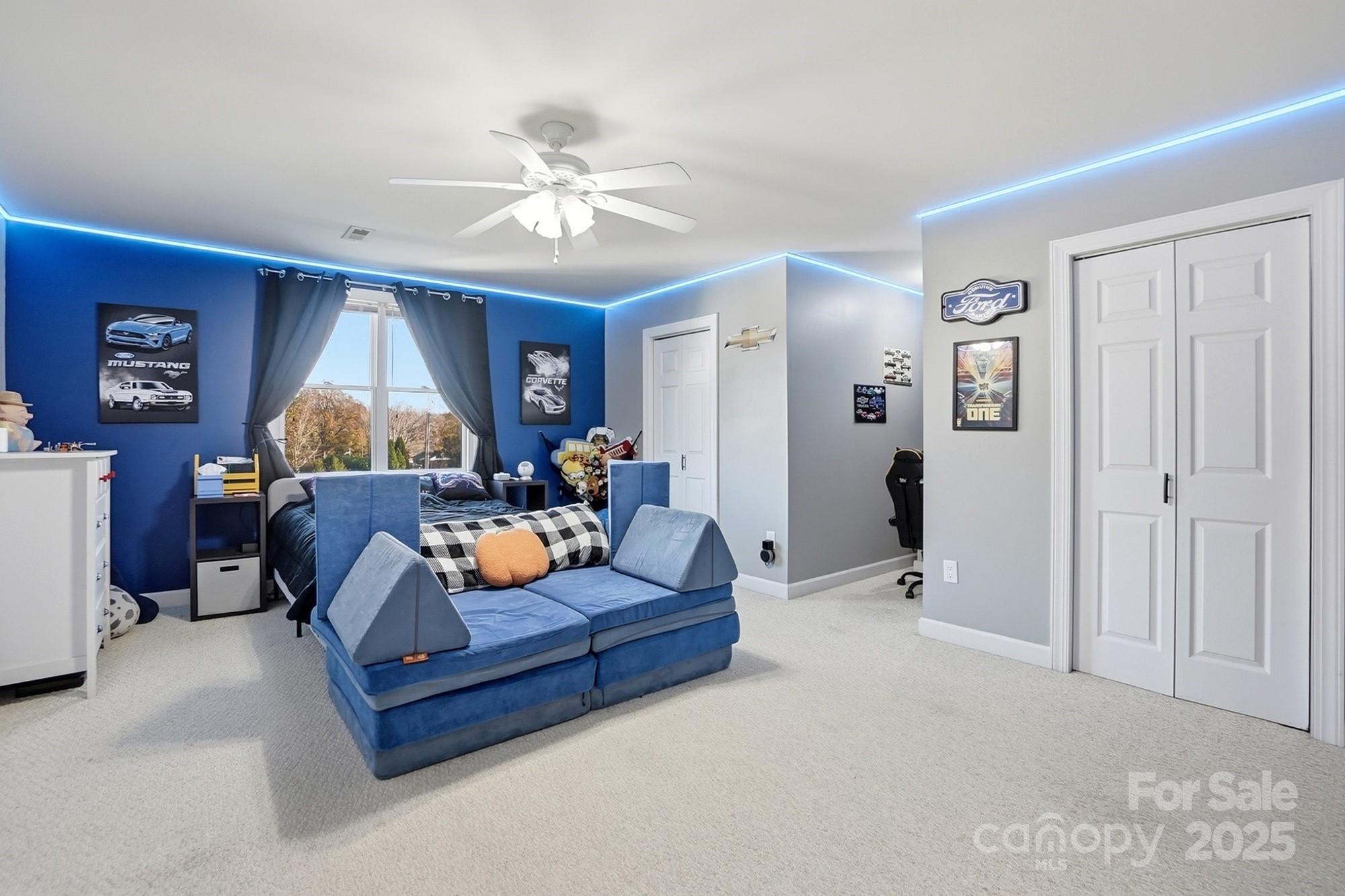 845 St Paul Church Road Salisbury, NC 28146 - Photo 43 of 44 a living room with furniture and a chandelier
