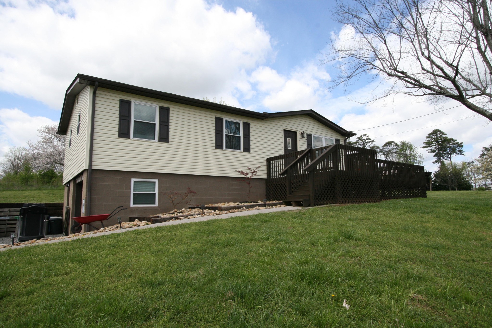209 South Springview Road Maryville, TN 37801 - Photo 1 of 40 a house view with a garden space