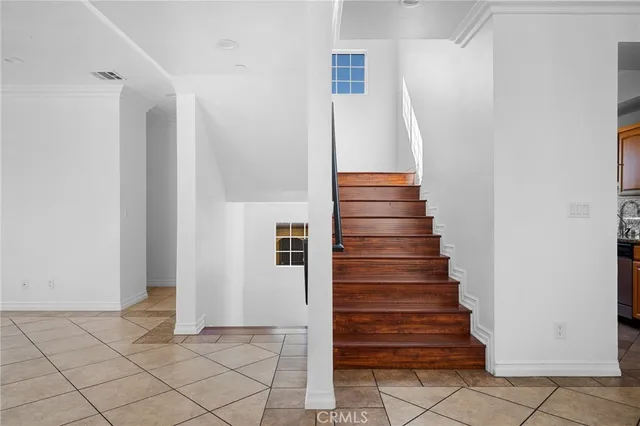 a view of entryway with stairs