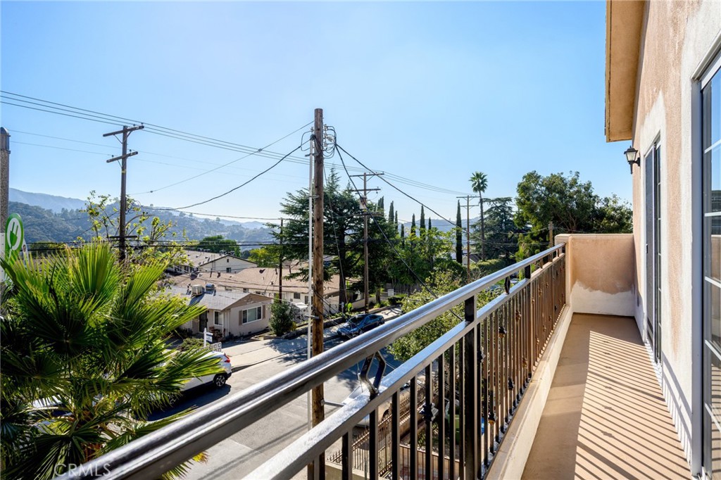 6831 Valmont Street, Unit 1 Tujunga, CA 91042 - Photo 20 of 30 a view of a balcony with flower plants