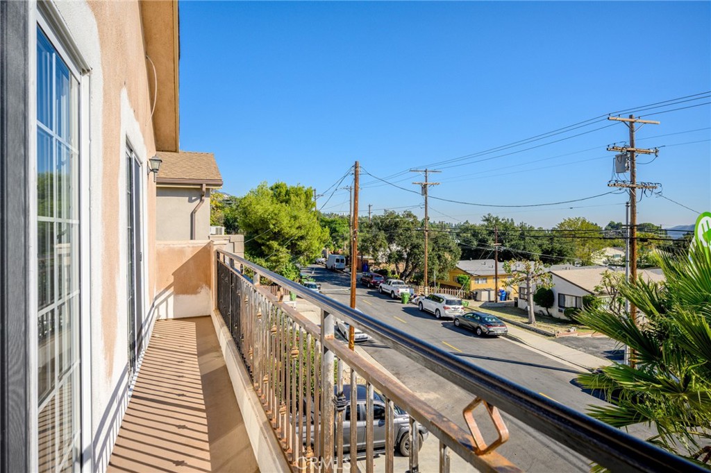 6831 Valmont Street, Unit 1 Tujunga, CA 91042 - Photo 25 of 30 a view of a balcony with chairs