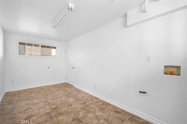 a view of a hallway with closet