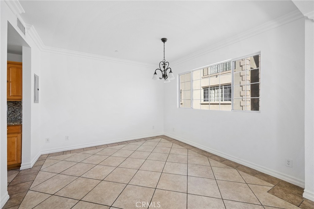 6831 Valmont Street, Unit 1 Tujunga, CA 91042 - Photo 9 of 30 a view of an empty room with a window