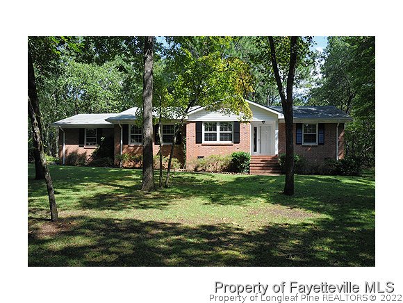 400 Myra Road Raeford, NC 28376 - Photo 1 of 24 a view of house with a yard