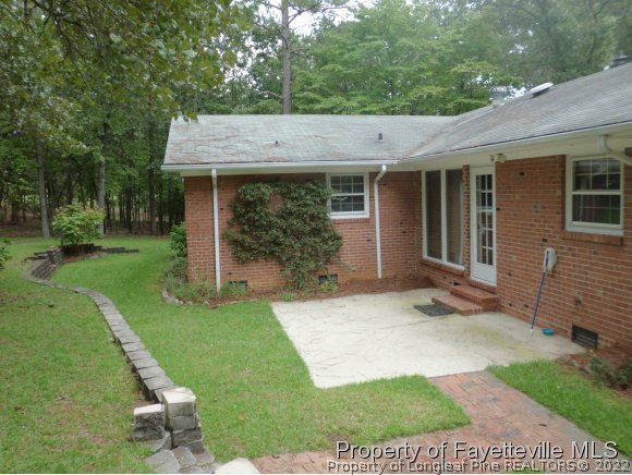 400 Myra Road Raeford, NC 28376 - Photo 18 of 24 front view of a house with a yard