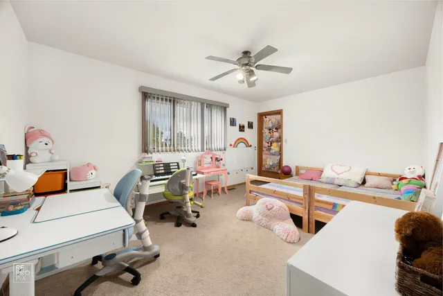 a view of a workspace with furniture