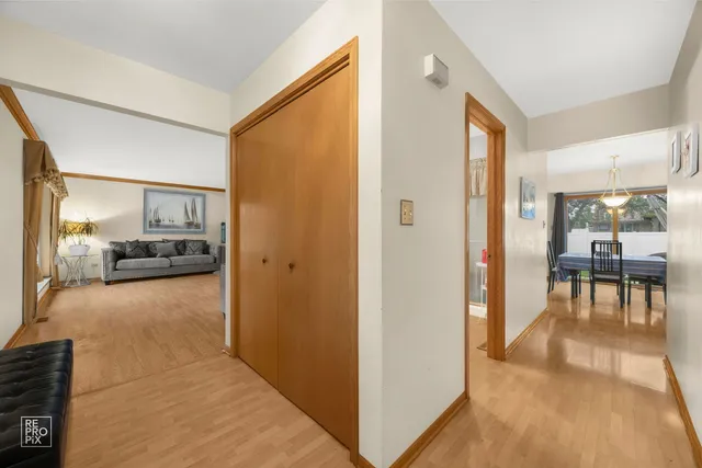 a view of living room filled with furniture and furniture