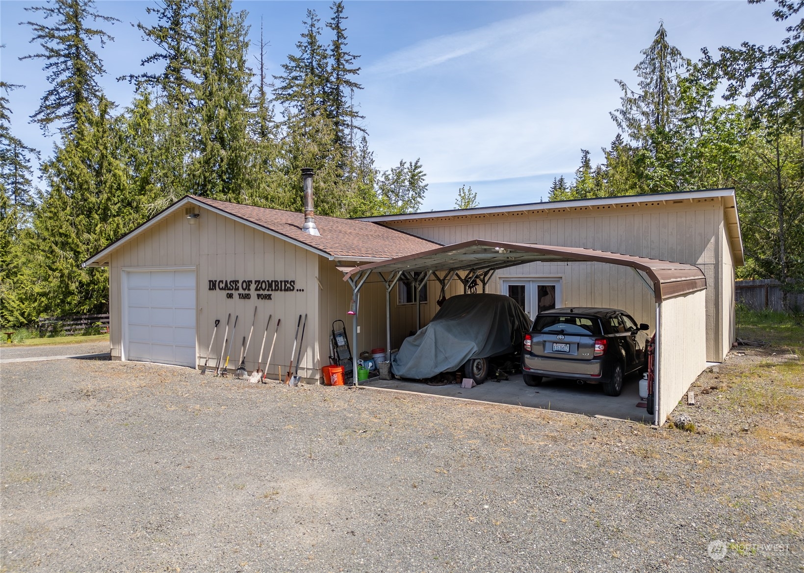 74 Miles Road Port Angeles, WA 98362 - Photo 6 of 40 a view of a car parked in front of house