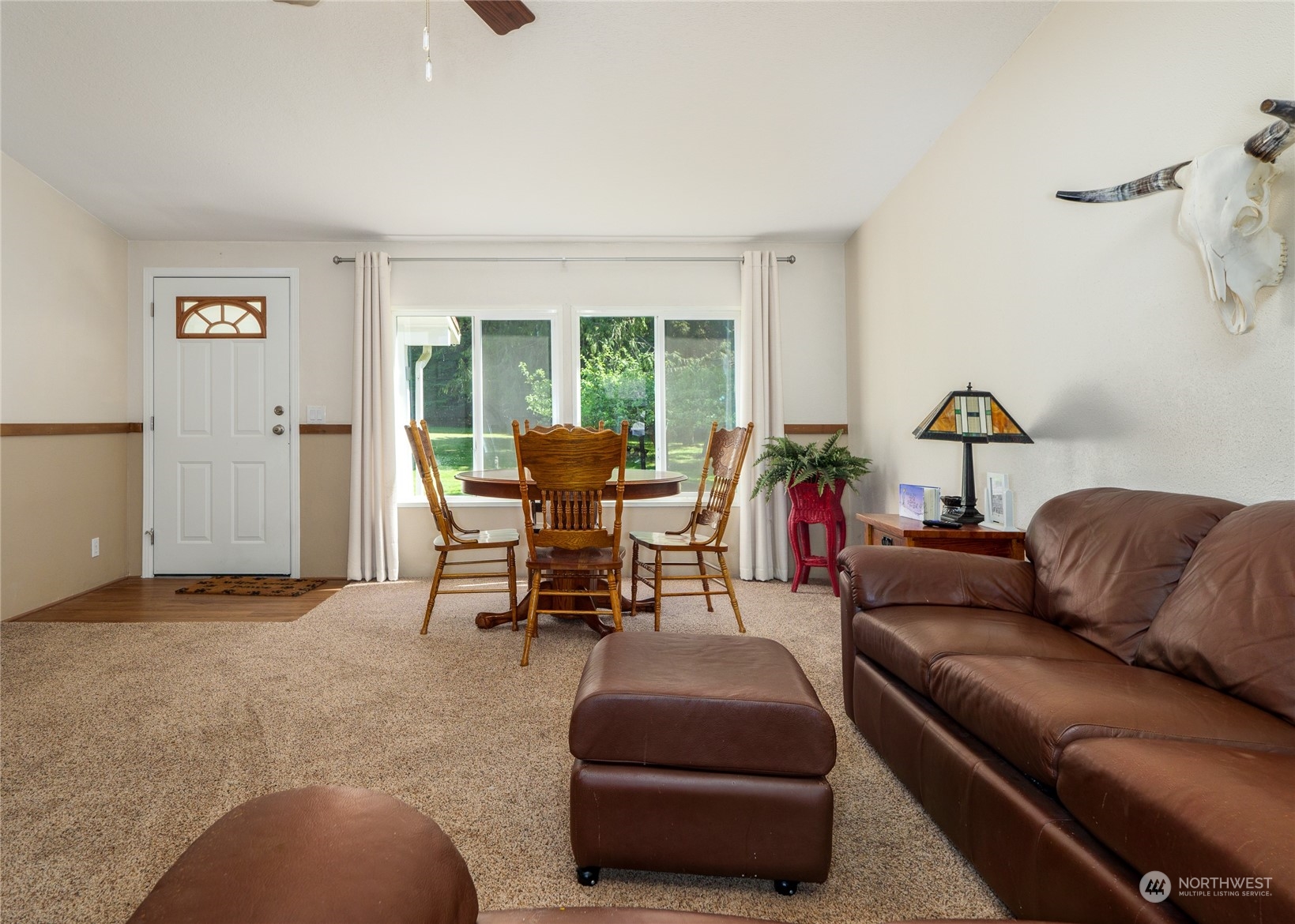 74 Miles Road Port Angeles, WA 98362 - Photo 8 of 40 a living room with furniture and a window