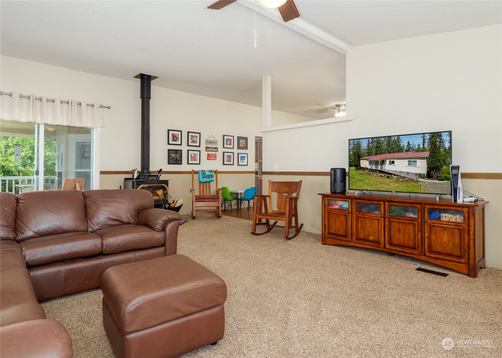 74 Miles Road Port Angeles, WA 98362 - Photo 10 of 40 a living room with furniture and a flat screen tv