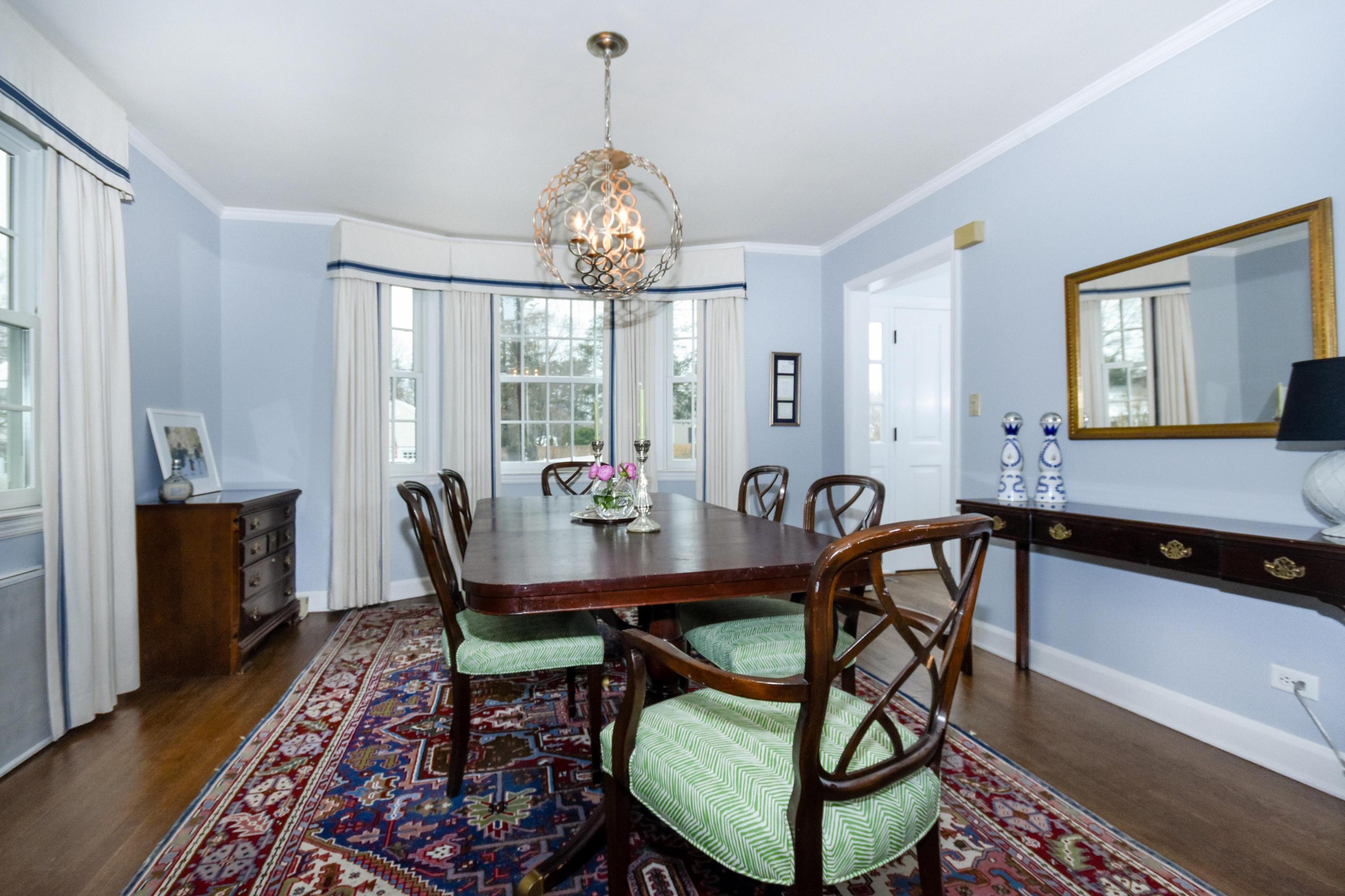 17 Abbey Road Darien, CT 06820 - Photo 8 of 24 a view of a dining room with furniture window and wooden floor