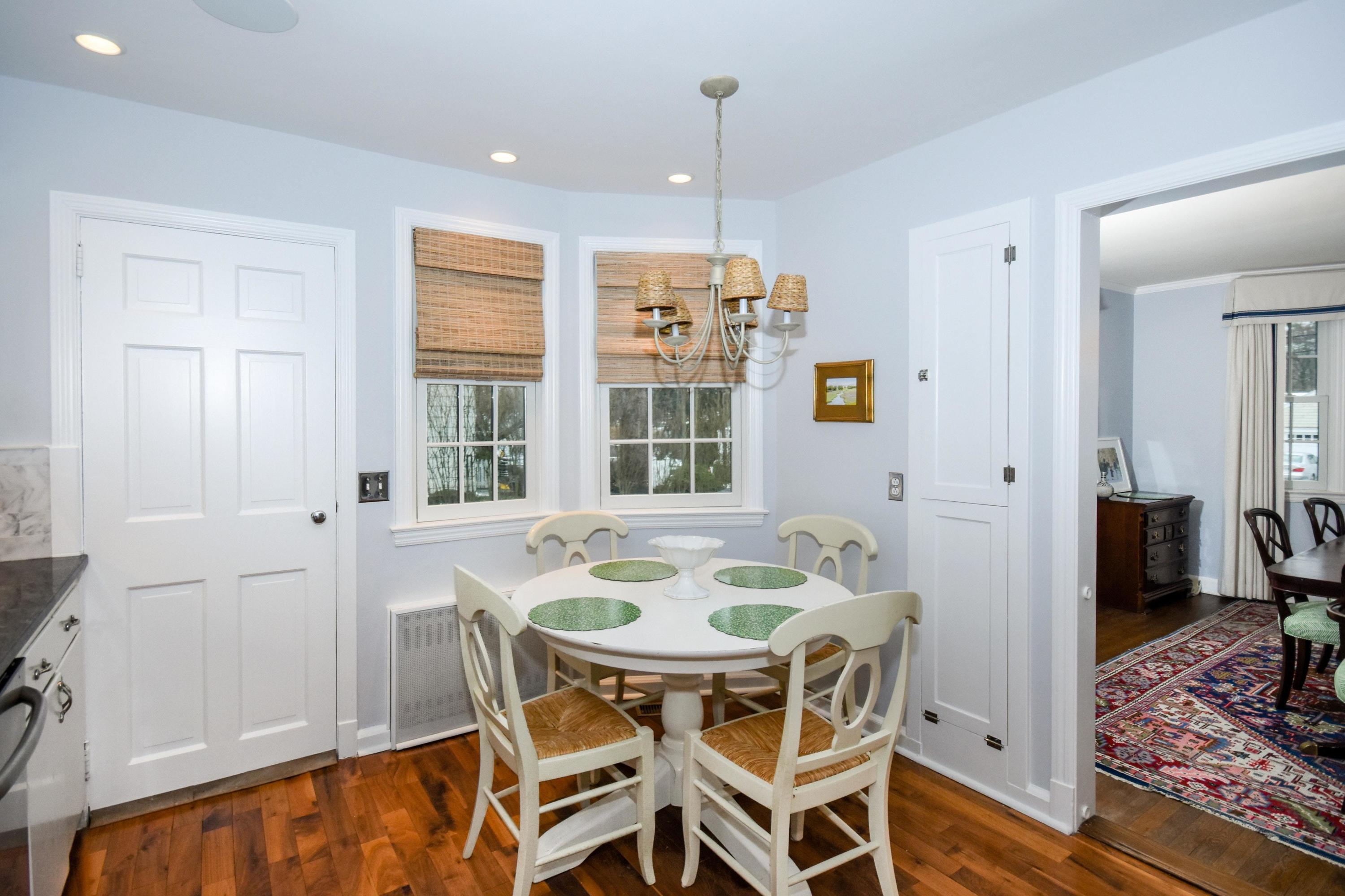 17 Abbey Road Darien, CT 06820 - Photo 10 of 24 a view of a dining room with furniture window and wooden floor