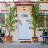 a potted plants sitting in front of a house