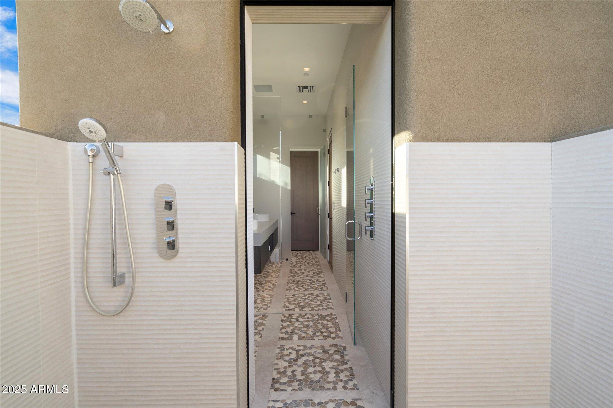 10585 East Crescent Moon Drive, Unit 44 Scottsdale, AZ 85262 - Photo 71 of 88 074-Casita Outdoor Shower