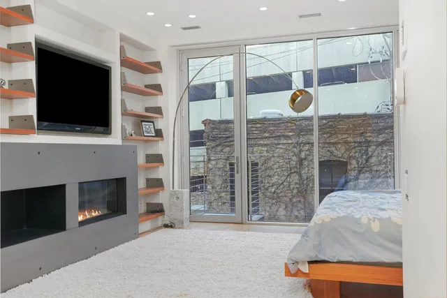 a living room with fireplace