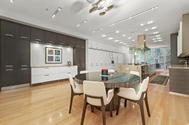 a view of a dining room with furniture