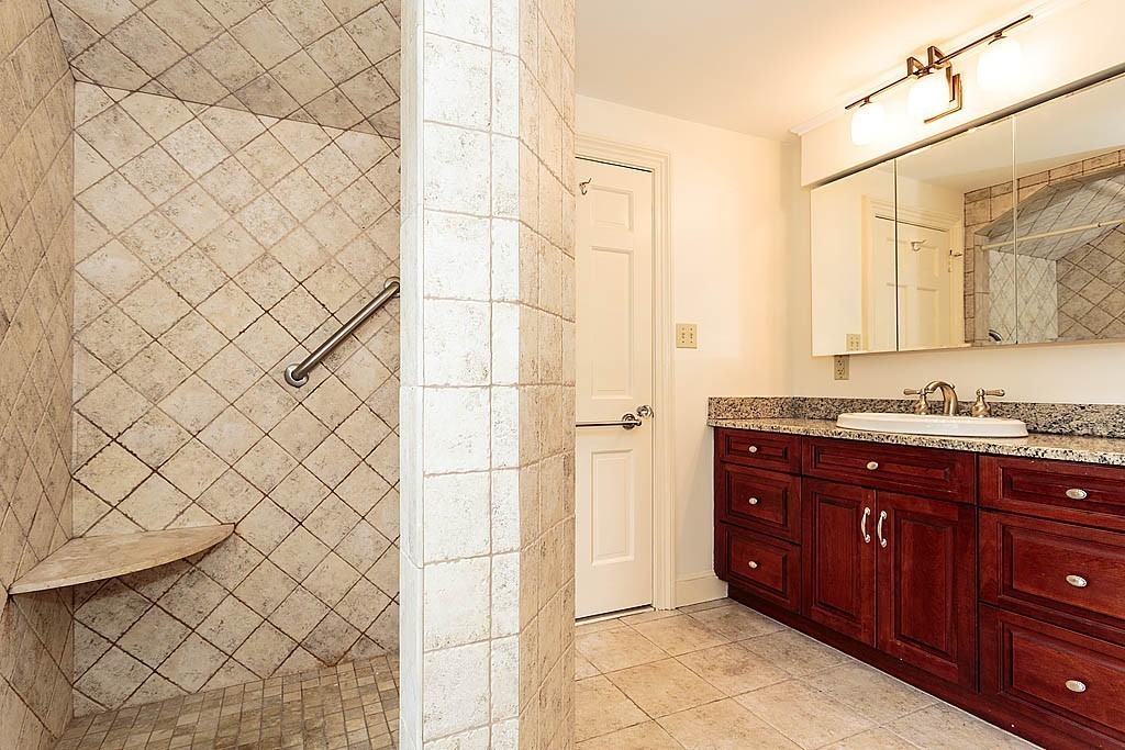 107 Rutledge Road Belmont, MA 02478 - Photo 14 of 16 a bathroom with a sink and a shower