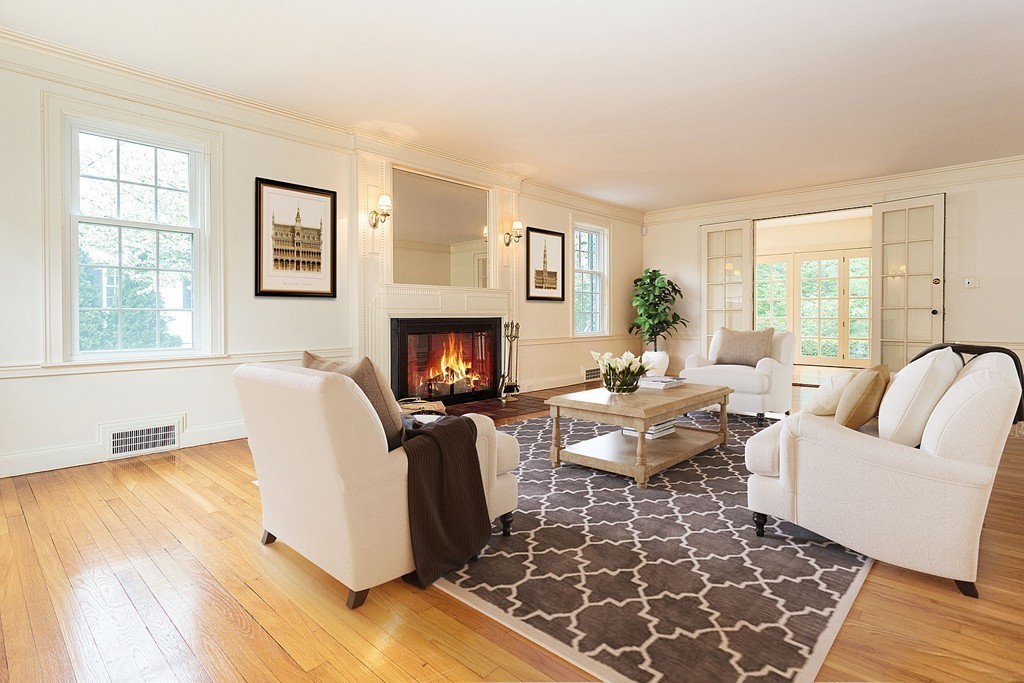 107 Rutledge Road Belmont, MA 02478 - Photo 3 of 16 a living room with furniture a rug and a fireplace