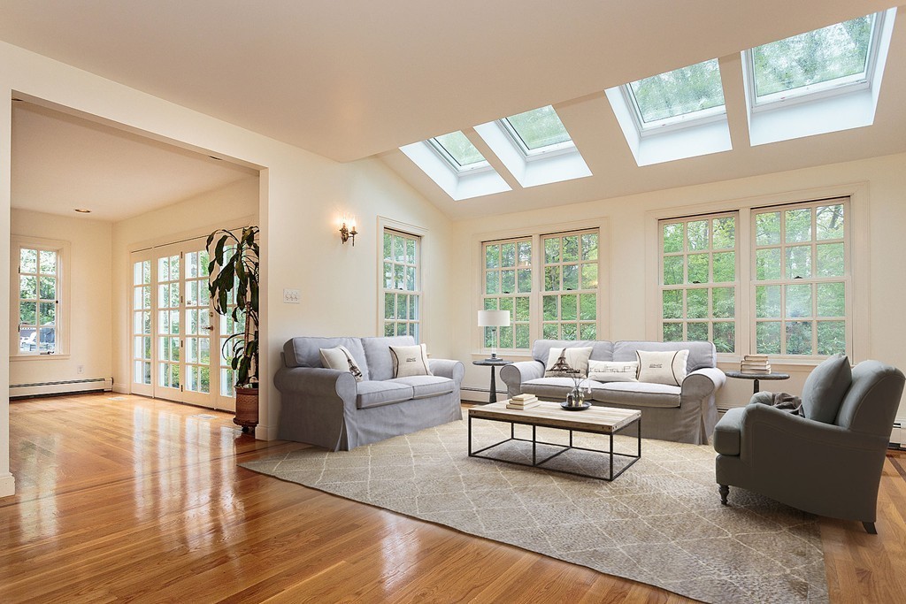 107 Rutledge Road Belmont, MA 02478 - Photo 5 of 16 a living room with furniture and a large window