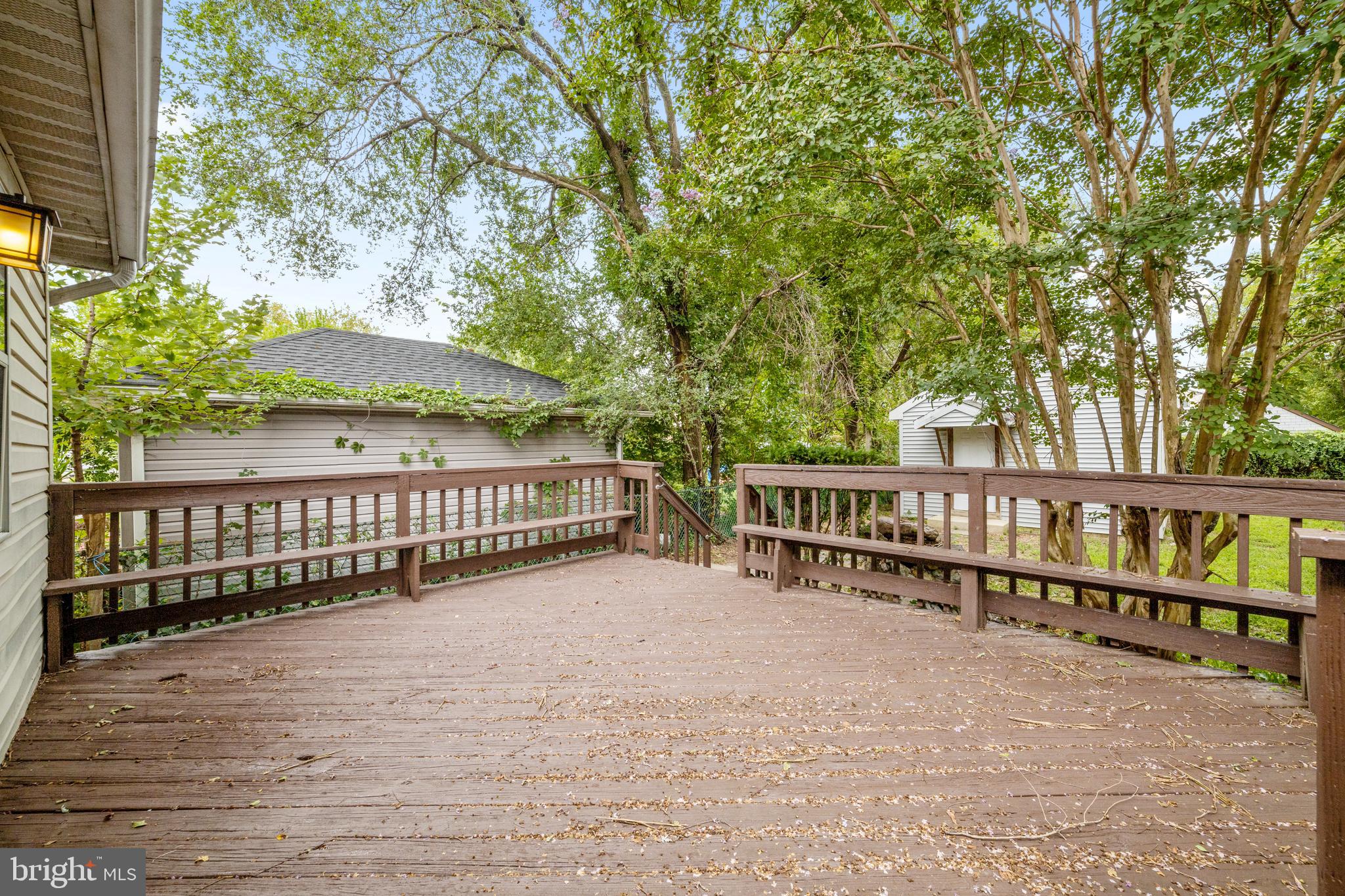 606 4th Street Riverside, NJ 08075 - Photo 36 of 37 a view of a wooden deck and a yard