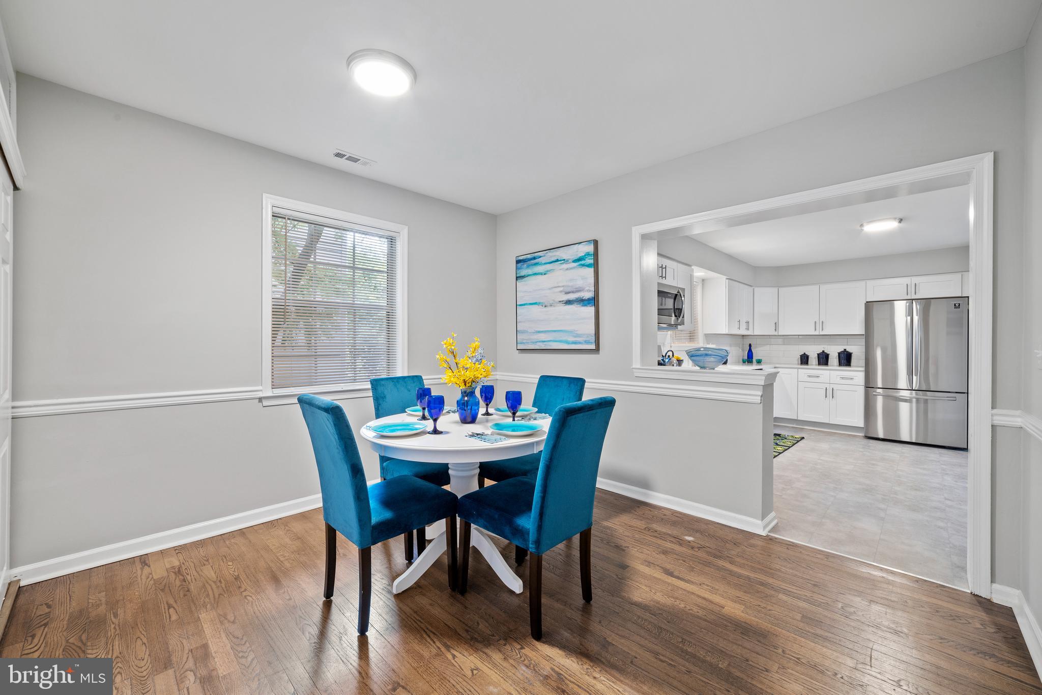 606 4th Street Riverside, NJ 08075 - Photo 10 of 37 a view of a dining room with furniture and wooden floor