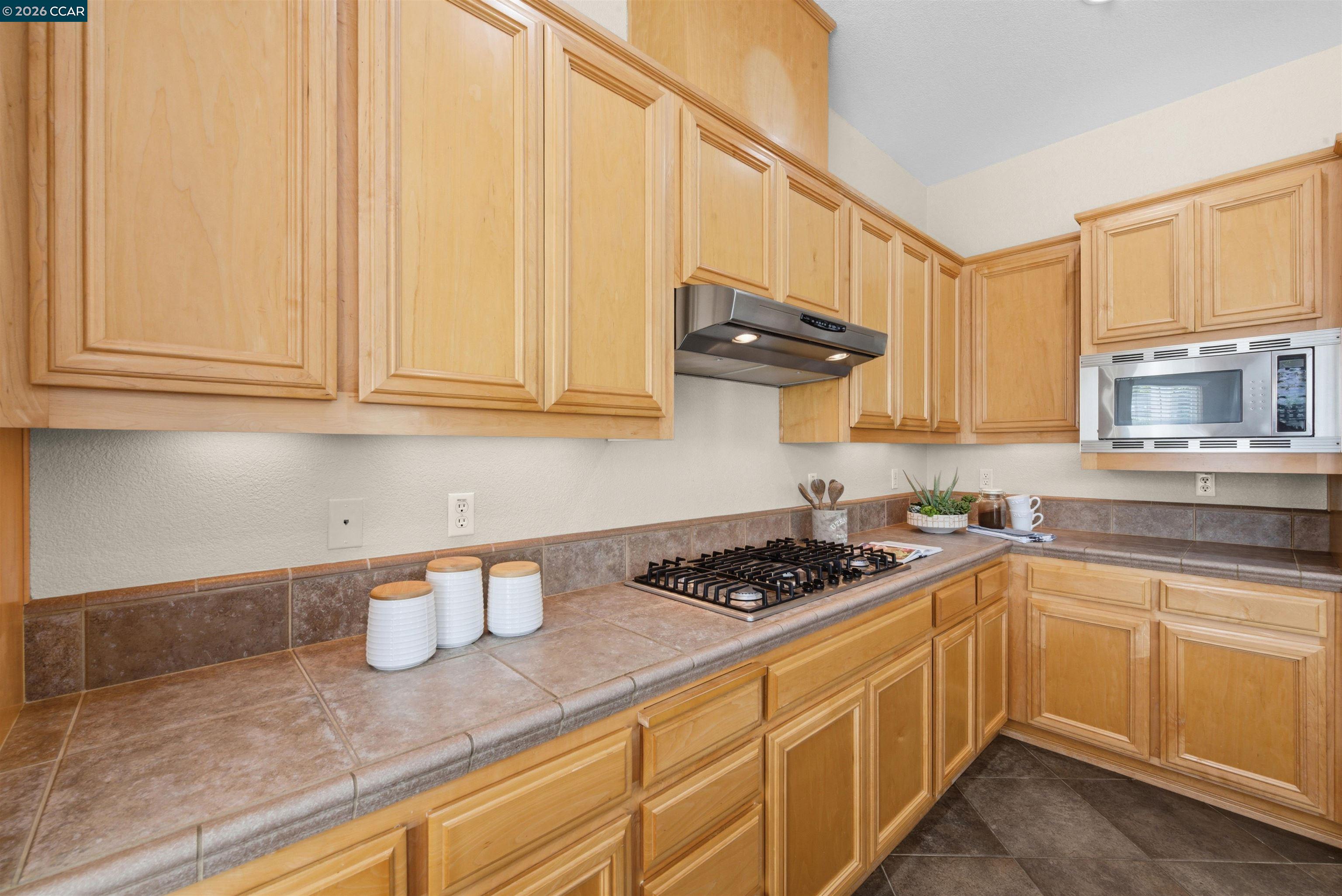 5260 Hiddencrest Court Concord, CA 94521 - Photo 20 of 87 a kitchen with stainless steel appliances granite countertop a sink stove and cabinets