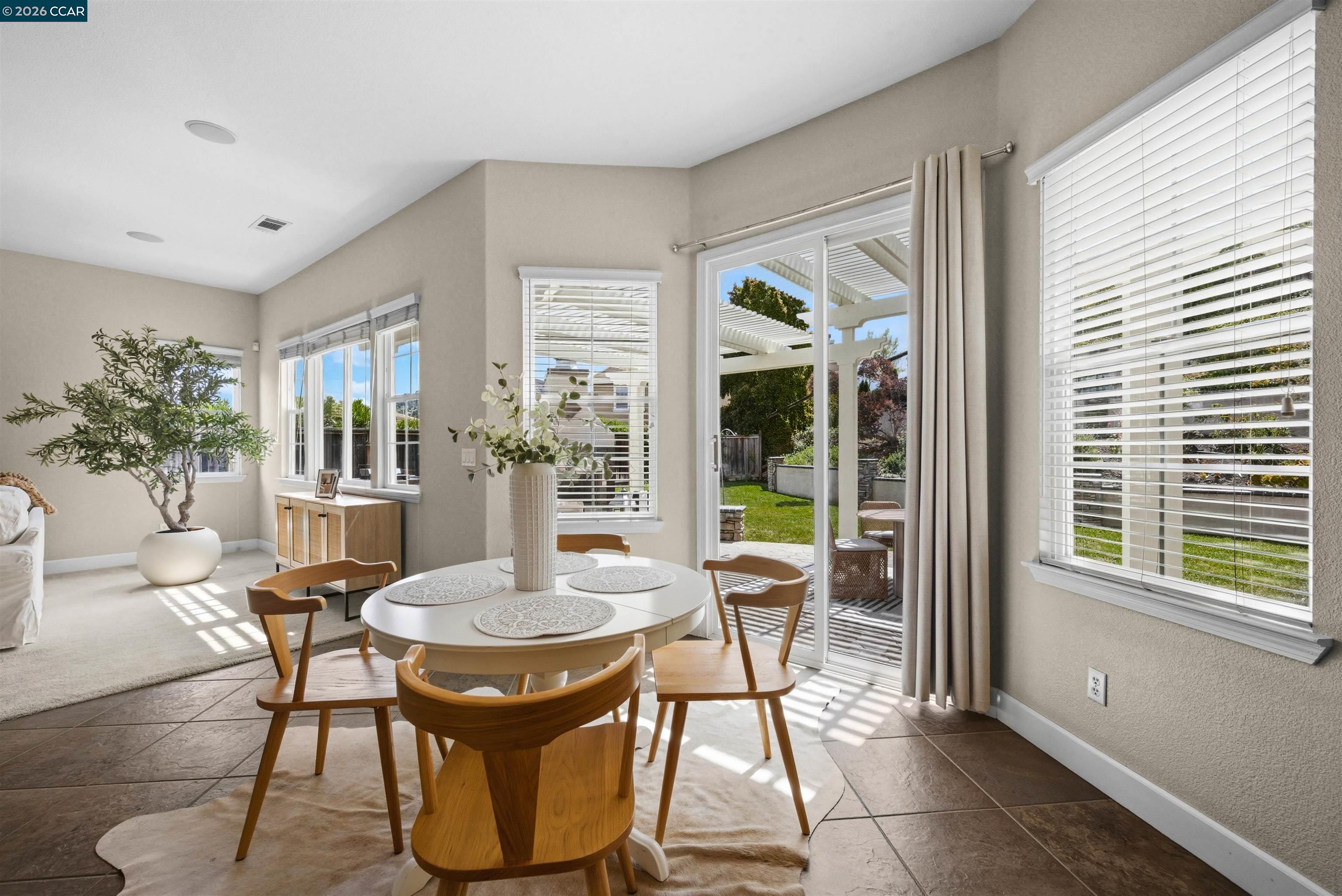 5260 Hiddencrest Court Concord, CA 94521 - Photo 25 of 87 a view of a dining room with furniture window and wooden floor