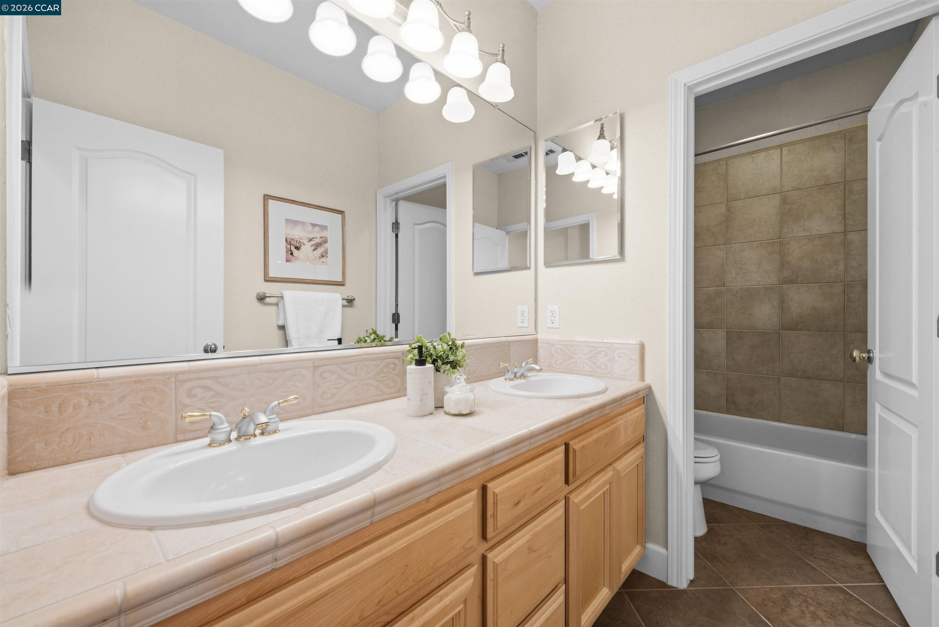 5260 Hiddencrest Court Concord, CA 94521 - Photo 38 of 87 a bathroom with a sink a toilet and shower