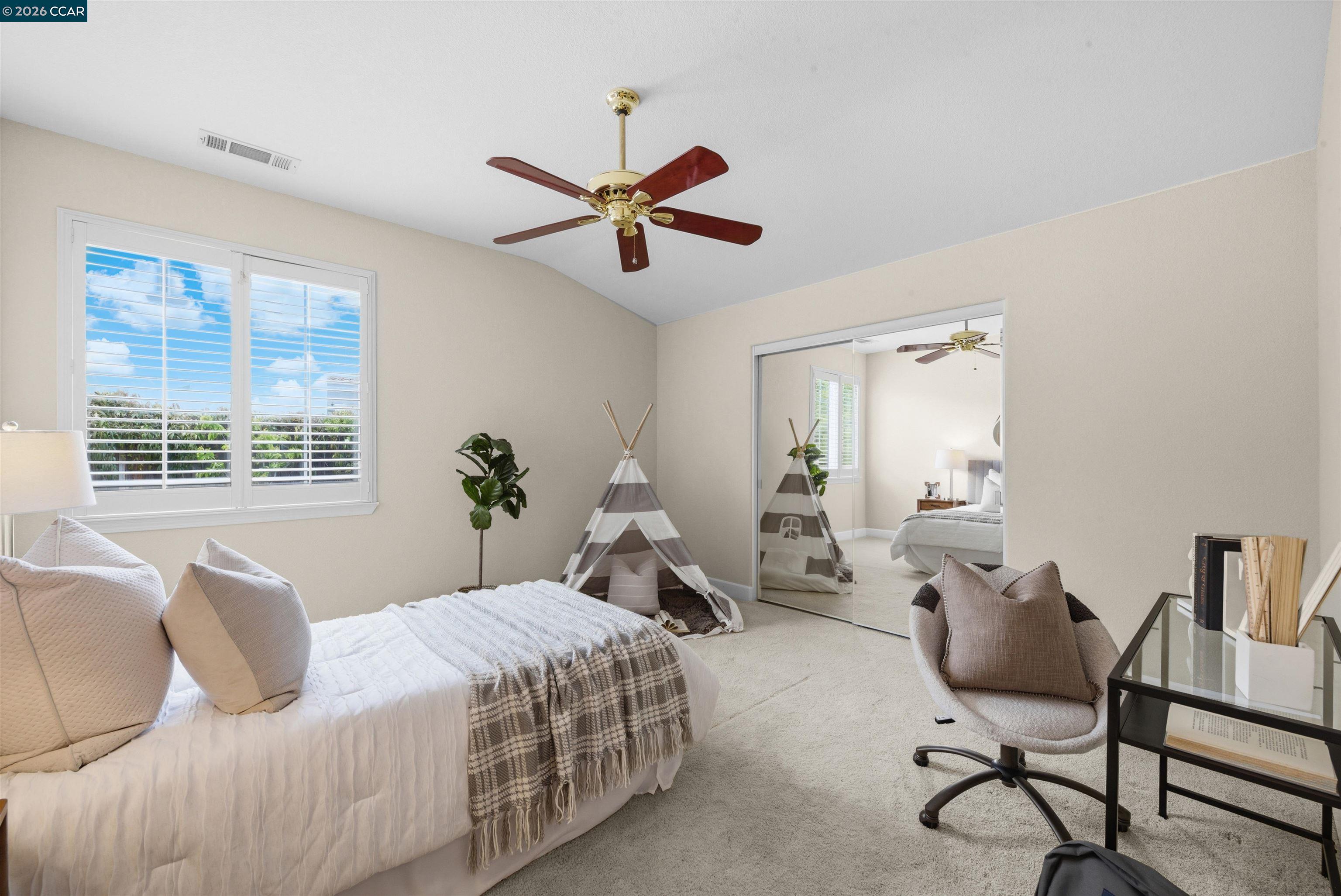5260 Hiddencrest Court Concord, CA 94521 - Photo 45 of 87 a bedroom with a bed a couch and a window