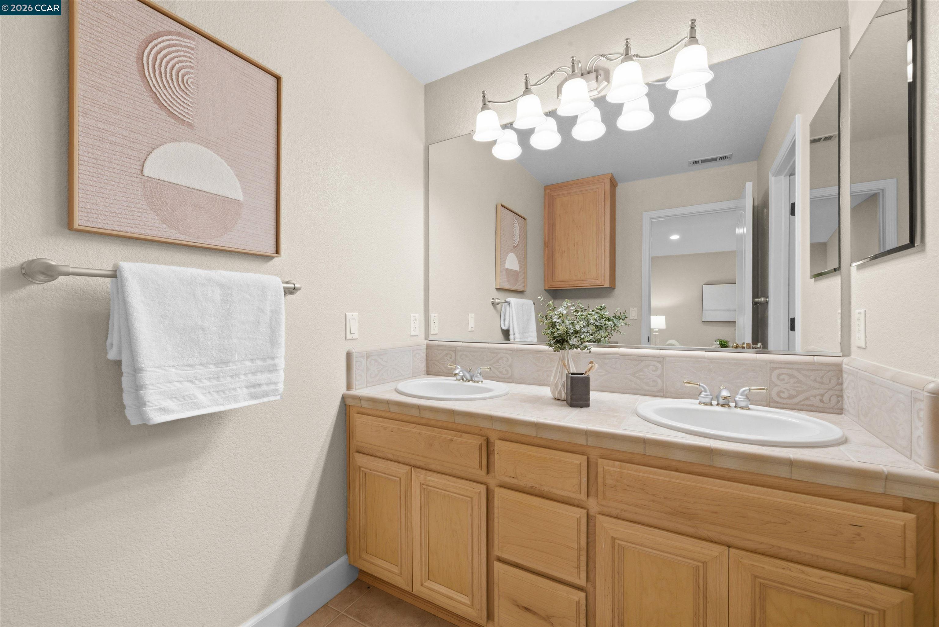 5260 Hiddencrest Court Concord, CA 94521 - Photo 47 of 87 a bathroom with a sink vanity and a mirror