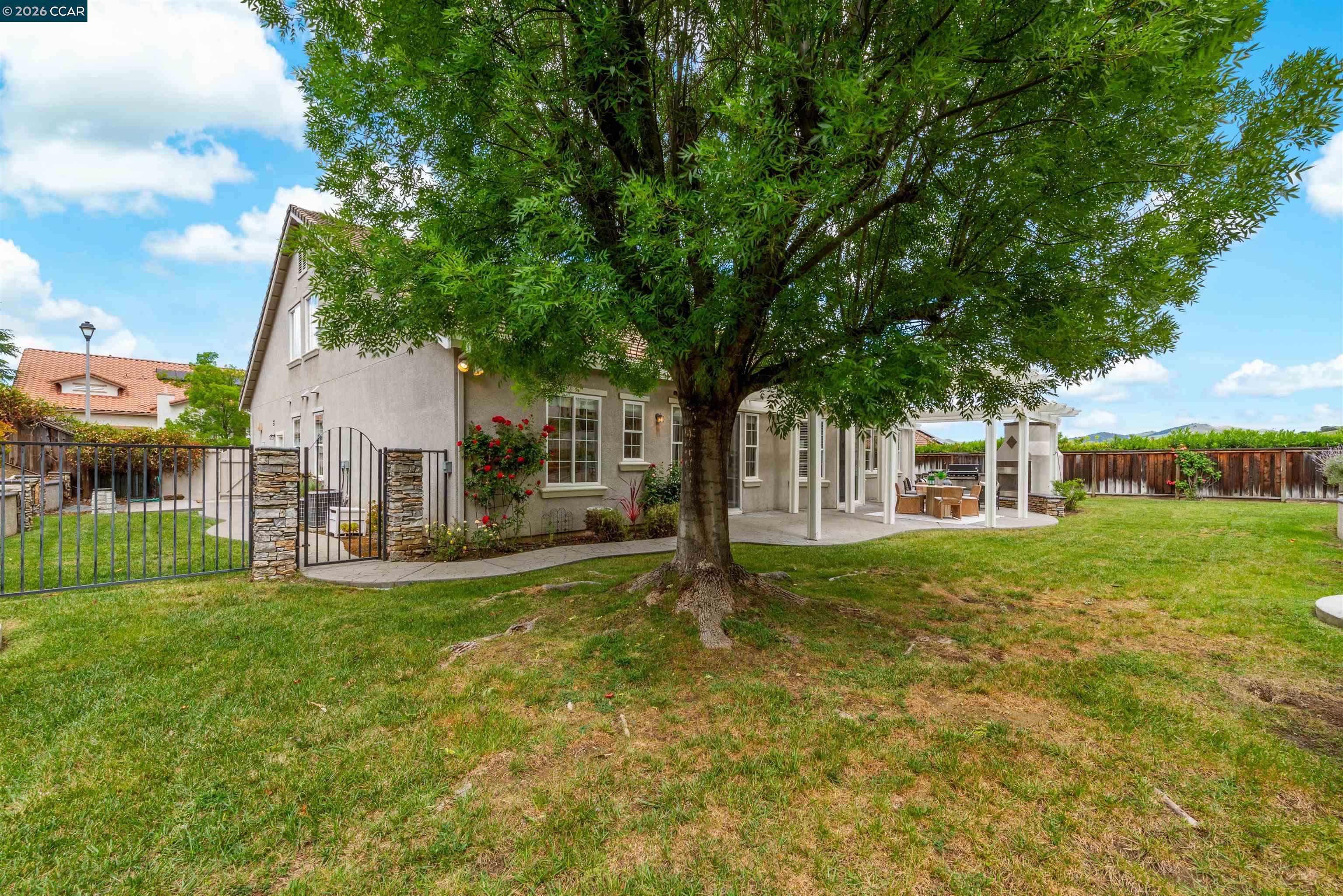 5260 Hiddencrest Court Concord, CA 94521 - Photo 65 of 87 a view of a house with a big yard and large trees