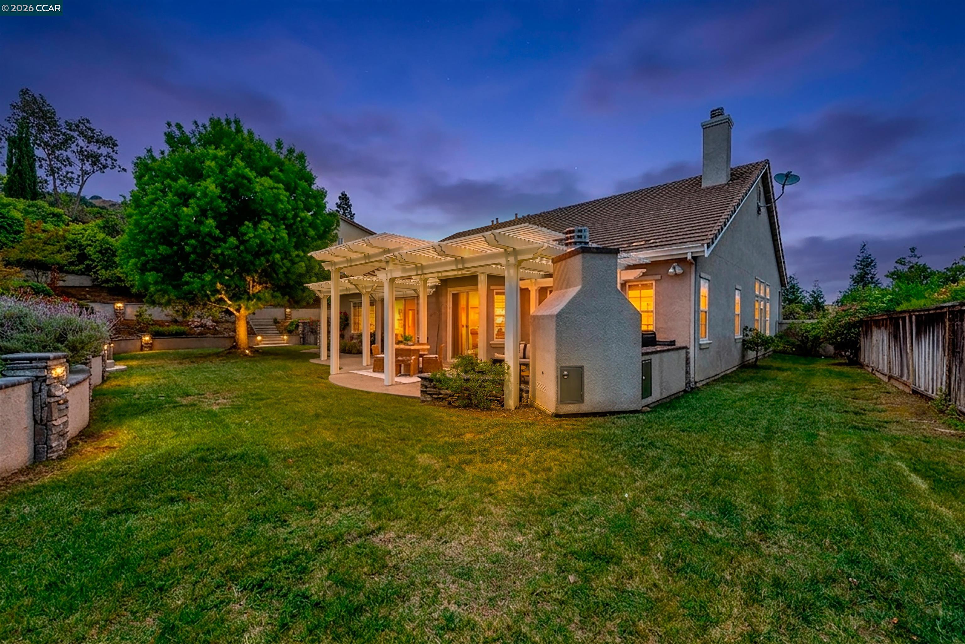 5260 Hiddencrest Court Concord, CA 94521 - Photo 75 of 87 a view of a house with a big yard and large trees