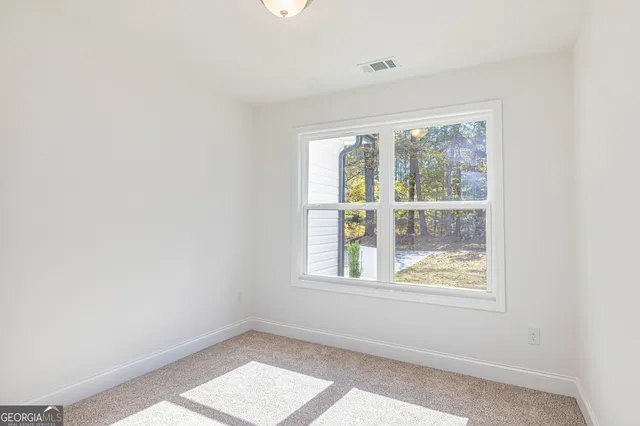 a view of kitchen with sink and wooden floor