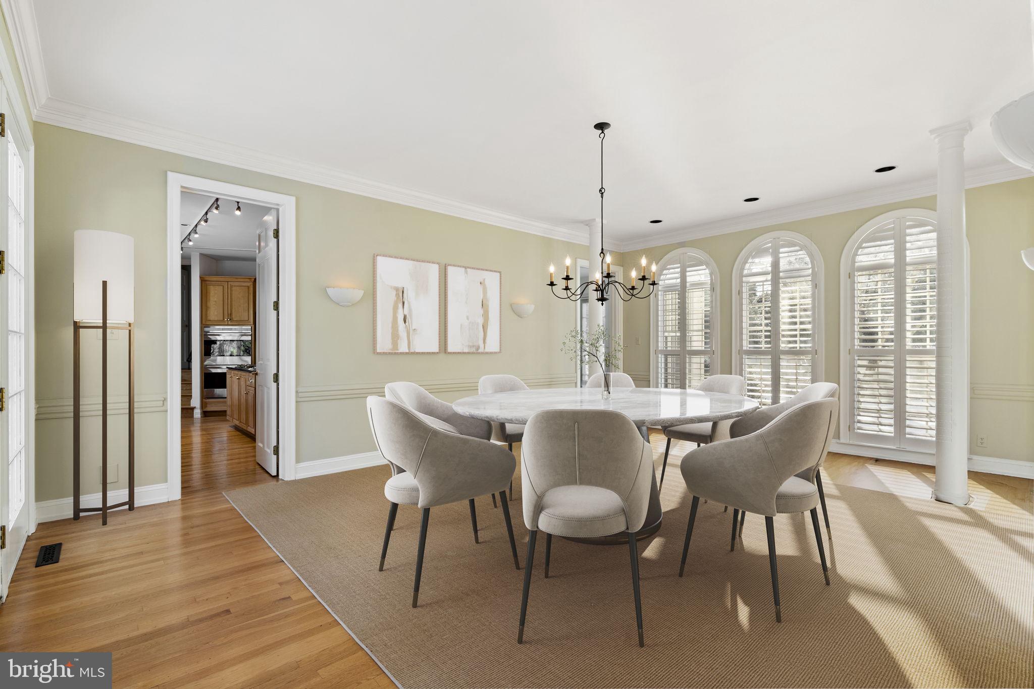 841 Mt Moro Road Villanova, PA 19085 - Photo 12 of 57 a dining room with furniture a chandelier and wooden floor