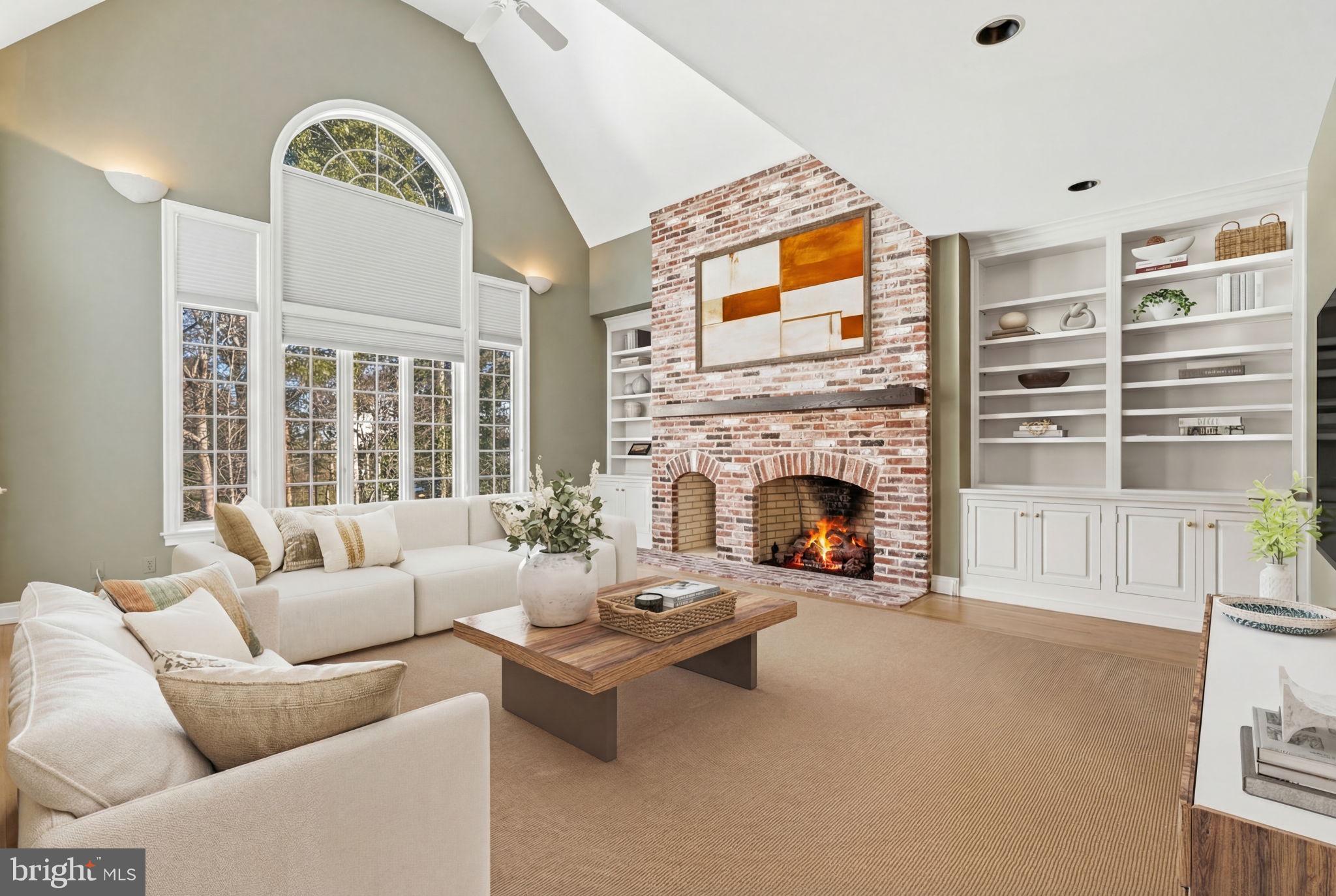 841 Mt Moro Road Villanova, PA 19085 - Photo 19 of 54 a living room with furniture and a fireplace