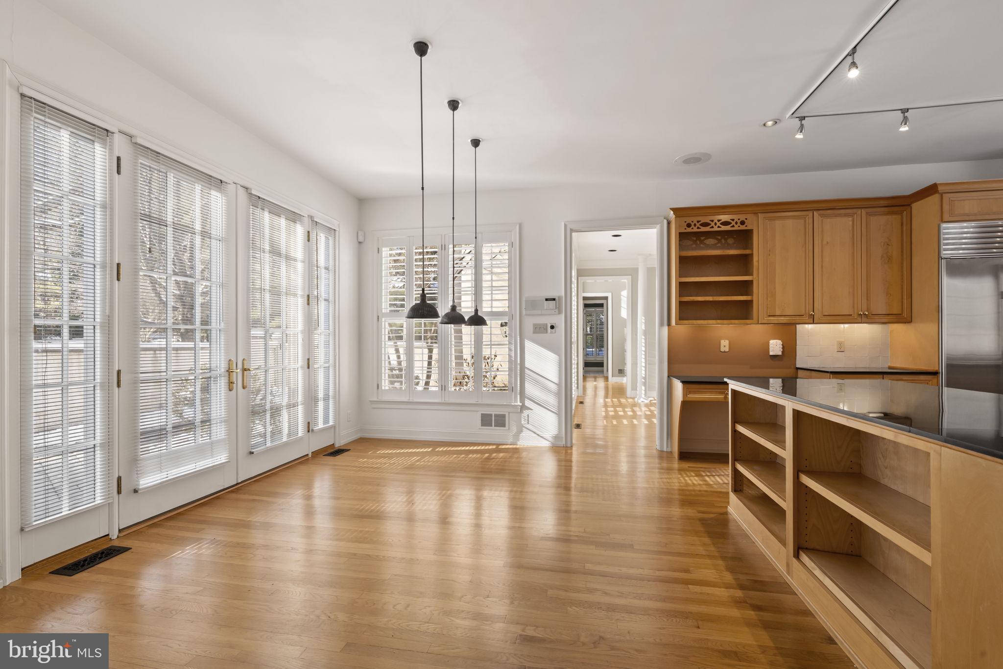 841 Mt Moro Road Villanova, PA 19085 - Photo 19 of 57 a view of an empty room with wooden floor and a window