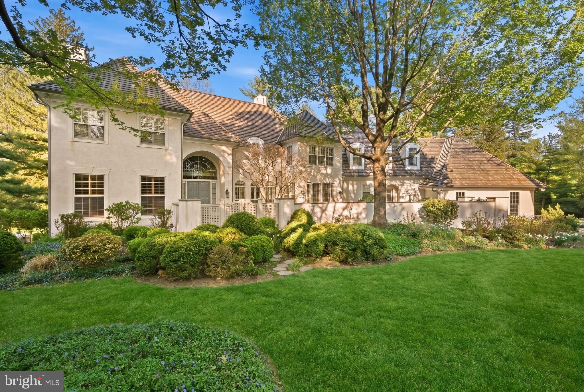 841 Mt Moro Road Villanova, PA 19085 - Photo 2 of 62 a front view of a house with a garden